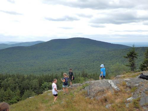 hikers at the view point on North Pack Monadnock Mountain in New Hampshire