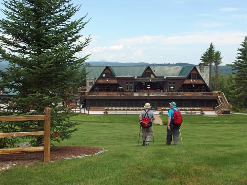 Dick and John hike down toward the ski area base lodge at Pats Peak in New Hampshire