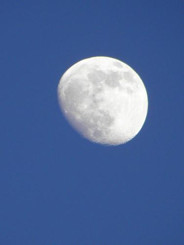 The almost-full moon as seen from Pinnacle Mountain in southern New Hampshire