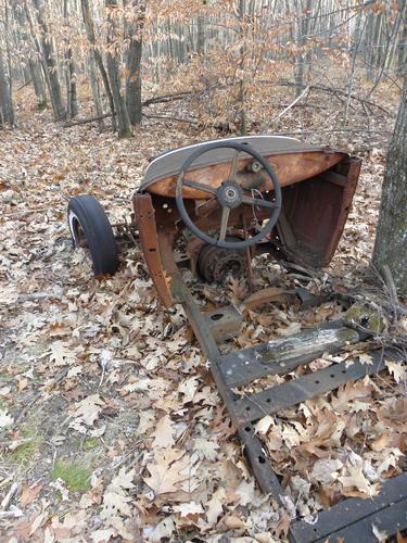 wrecked vehicle on the trail to Rose Mountain in New Hampshire