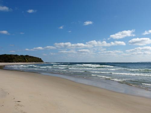 view from the sandbar tip looking back toward the Atlantic Ocean with Bar Head to the left at Sandy Point State Reservation near Newburyport in Massachusetts