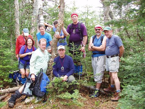 bushwhackers and canister on Scar Ridge West Peak in New Hampshire