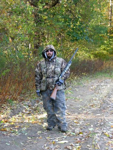 hunter on the Souhegan River Trail in New Hampshire
