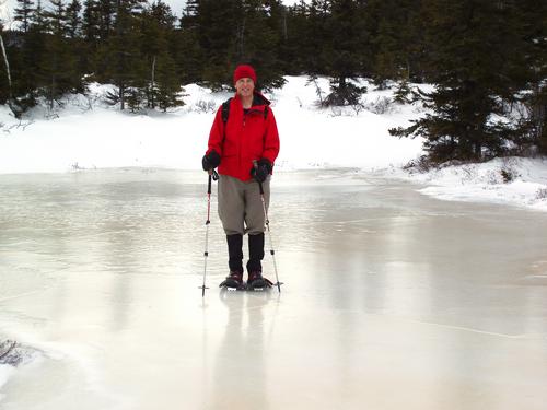 winter hiker on Speckled Mountain in Maine