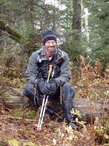 hiker on Teapot Mountain in New Hampshire