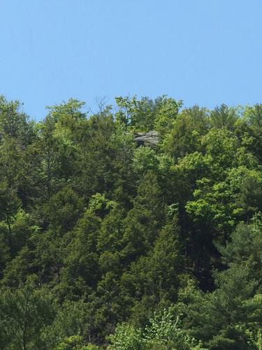 near-summit ledge as seen from the return trail at Tully Mountain in north central Massachusetts