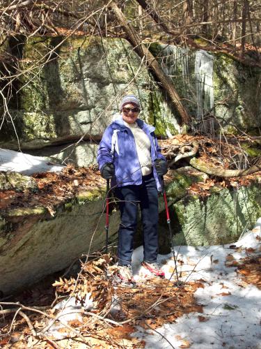 trailside rock in March at Velvet Rocks Peak in southwest New Hampshire