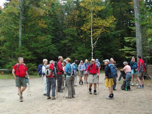 hikers assembling at the Christine Lake parking lot in New Hampshire