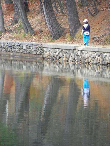 hiker at Walden Pond in Massachusetts