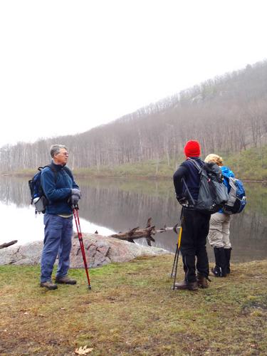 hikers at Indian Pond on the way to Wantastiquet Mountain in New Hampshire