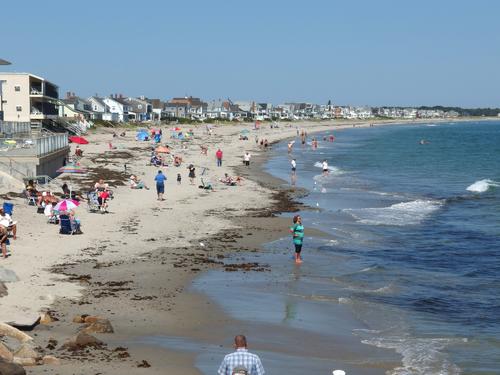 midweek September visitors enjoying Wells Beach in southern Maine