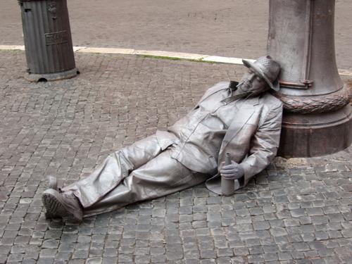 creative mime act down on the sidewalk in Rome, Italy